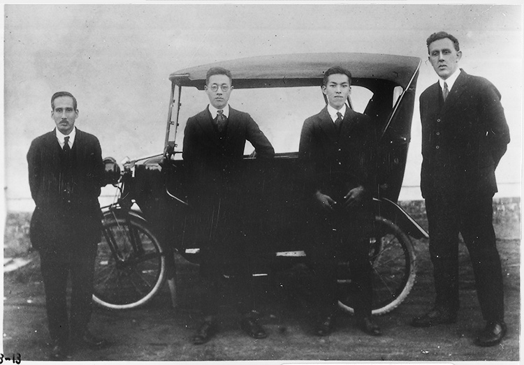 Mr. Gorham (on the right) and tricar